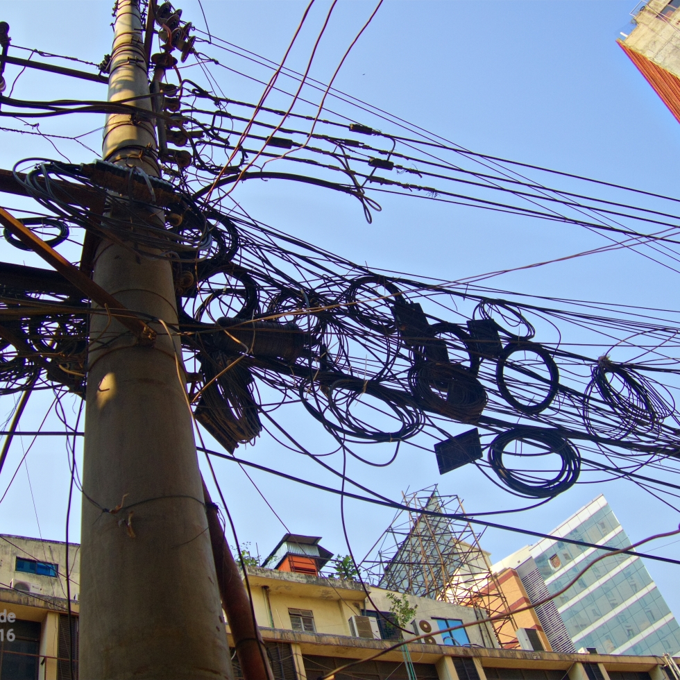 This extremely common sight in Dhaka never failed to make me nervous. An electricity pole is absolutly covered in wires going every which way, overlapping and tangling and coiling.